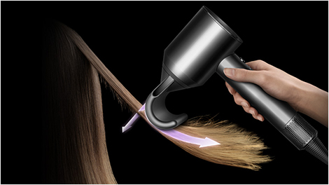 Model using Flyaway attachment on hair